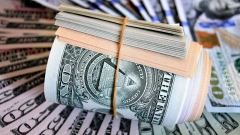 Аналитик Тузов заявил, что переход мира на торговлю в нацвалютах ослабит курс доллара