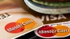 Visa и Mastercard приостановили работу в России