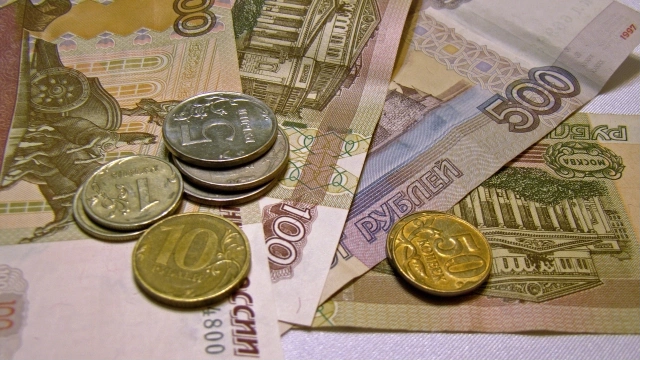 Банк "Открытие": Рубль остается под давлением сразу нескольких факторов