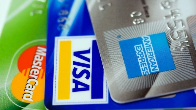 В терминалах и банкоматах Сбербанка начали принимать карты American Express