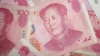 ЦБ Китая продолжает понижать курс юаня к доллару