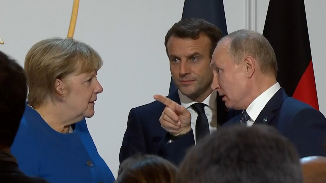 Меркель назвала Путина "победителем" на саммите в Париже