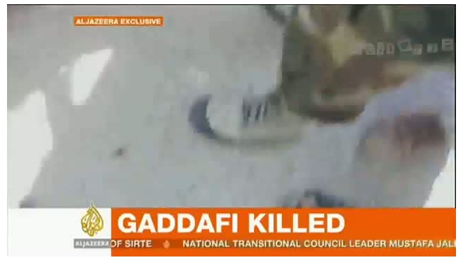Путин осудил телеканалы, показавшие кадры расправы над Каддафи