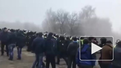 На Украине полиция силой расчищала путь для эвакуированных из Китая