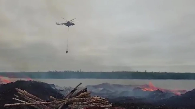 В Приангарье локализовали пожар на штабелях древесины