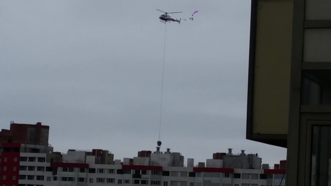 Петербуржцы сняли установку труб с помощью вертолета на долгострои ГК "Город"
