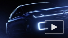 Volkswagen показал тизеры нового роскошного гибридного внедорожника