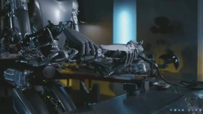 Tesla показала, как размножаются человекоподобные роботы Optimus: двое делают третьего