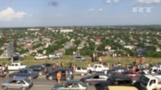 Люди в панике бежали из Крымска, опасаясь прорыва дамбы и нового потопа